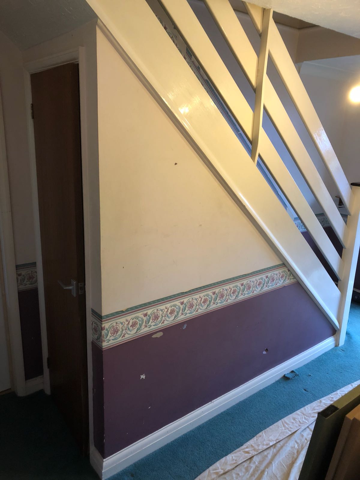 Under stairs cupboard doors closed